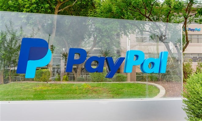 paypal logo on transparent sign outside of a corporate building